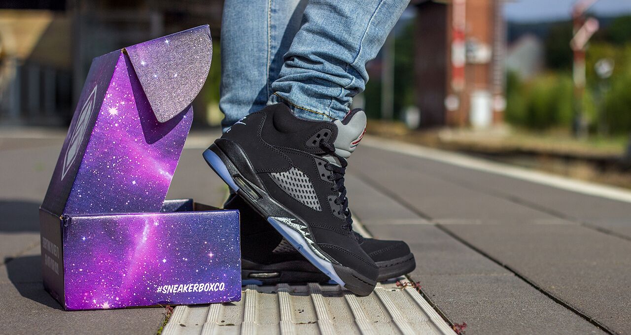 Sneakerbox galaxy packaging with Air Jordan sneakers